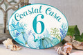 Address plaque hand painted with blue shells and corals, personalized with name, coastal outdoor wall decor