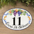 Personalized house number sign hand painted with purple and blue  grapes in Italian style, Family name on the bottom part plaque