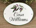 custom house sign hand painted with an olive branch, personalized with family name, outdoor wall decor