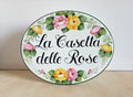 Oval ceramic house name sign hand-painted with pink and yellow roses
