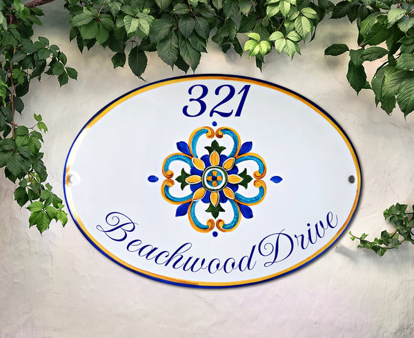 oval ceramic house number plaque hand-painted with Mediterranean decor