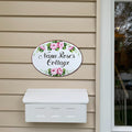 oval ceramic house sign hand-painted with roses 
