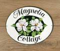 house name sign with magnolia