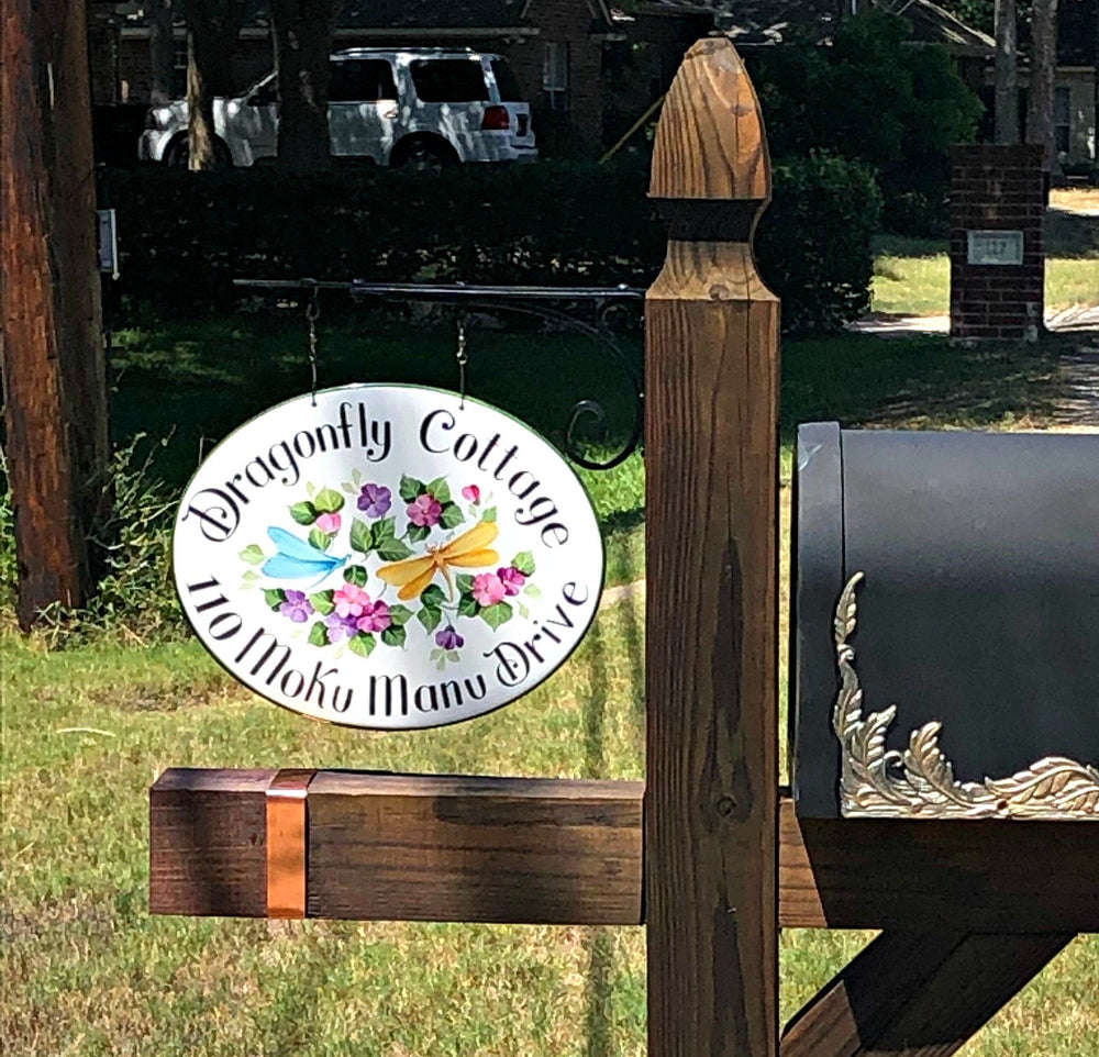Oval ceramic hangin sign hand painted with dragonflies and colored flowers