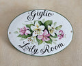 oval ceramic door sign hand-painted with white and pink lily 
