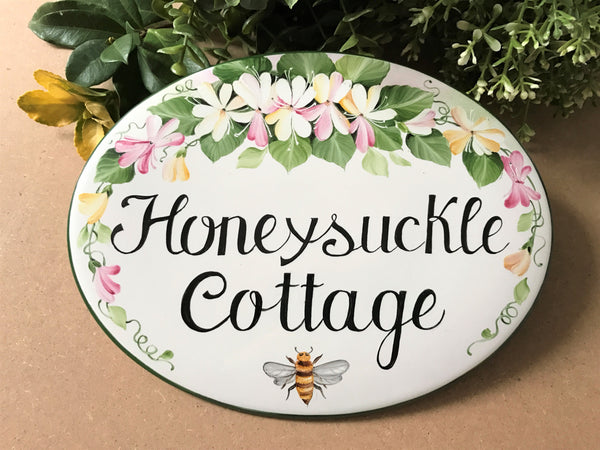 oval ceramic house sign for outdoor personalized with name, hand painted with honeysuckle and bees, front door decor