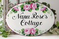 ceramic oval sign with pink roses