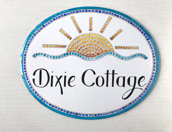 ceramic cottage name sign with sun