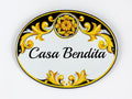 Ceramic House name sign hand painted with talevera motif in yellow and black colors