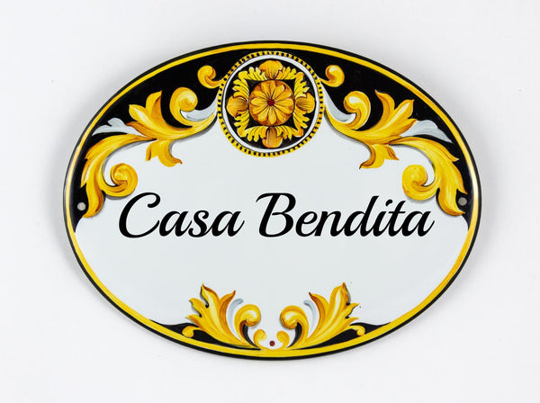 Ceramic House name sign hand painted with talevera motif in yellow and black colors