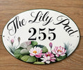 oval ceramic address sign hand-painted with water lily