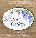Ceramic house sign with hand painted wisteria in blue and purple tones