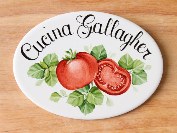 cucina sign with tomatoes