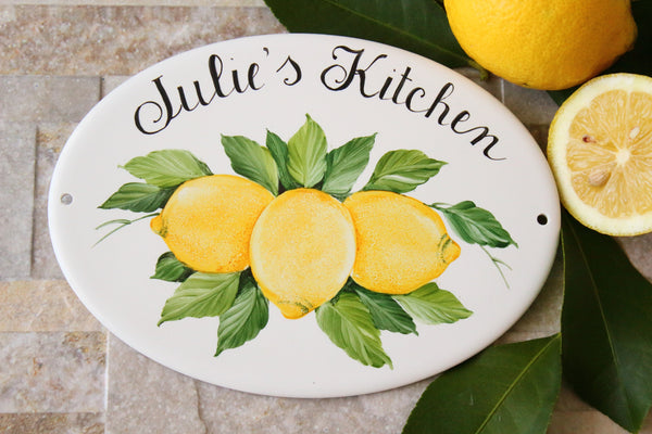 oval ceramic kitchen sign with lemons and name