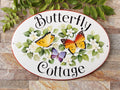 house sign for cottage with butterflies and name