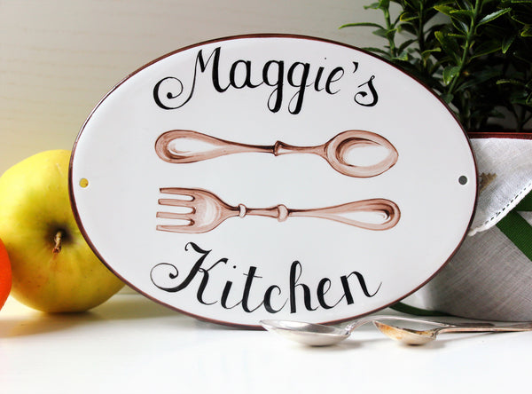 oval kitchen sign with cutlery