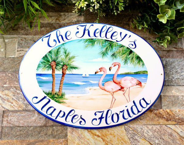 ceramic house name plaque with flamingo, beach and palm trees