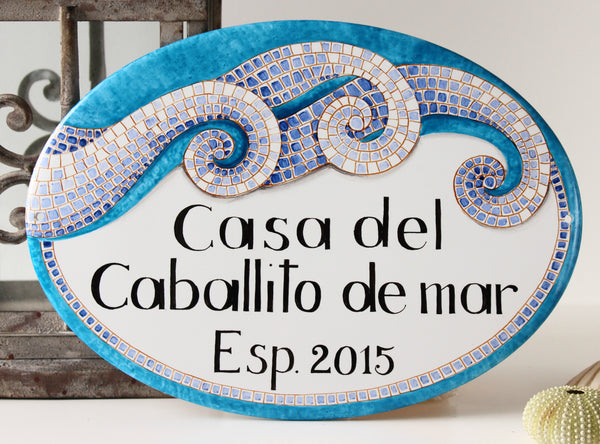 teal ceramic house name sign hand-painted with mosaic waves