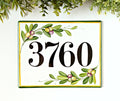 house number sign with olives branches