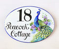 house number plaque peacock