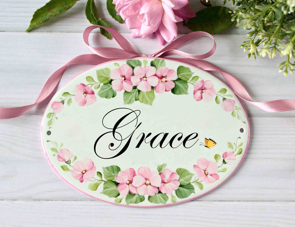 baby name sign with pink flowers