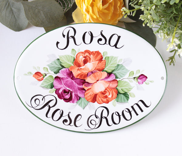 door sign with roses
