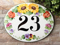 oval ceramic house number with flowers