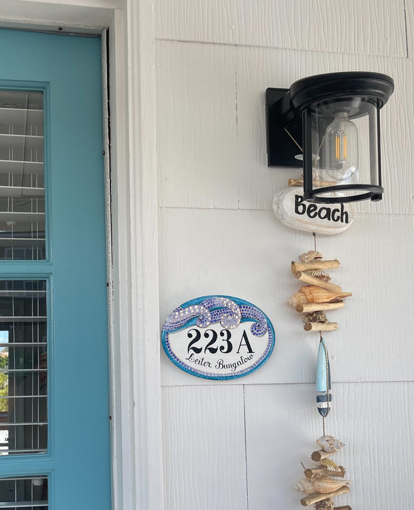 ceramic house number plaque hand-painted with teal waves mosaic